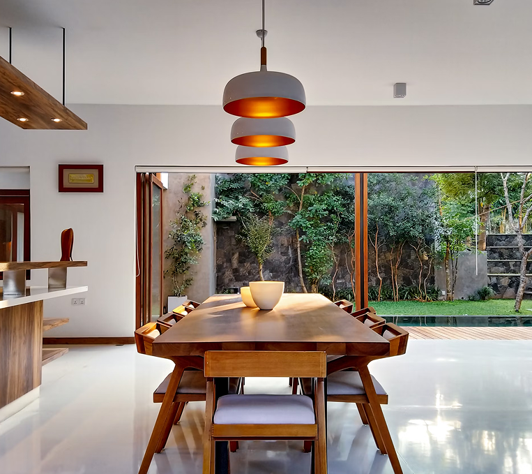 Modern dining space with garden view